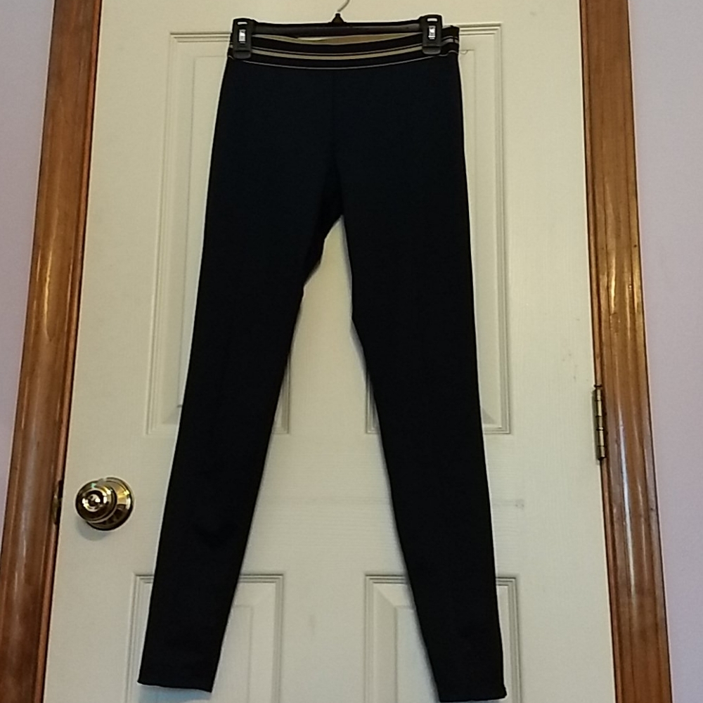 Black leggings with gold stripe